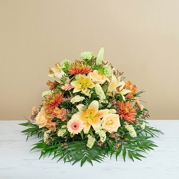 Funeral composition in gold tones