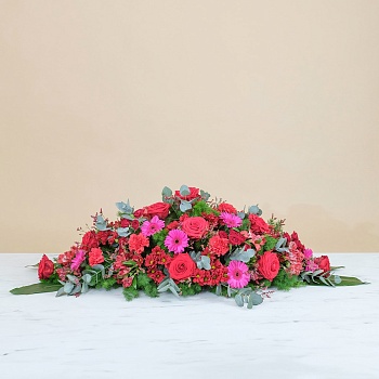 Coffin cover with red roses